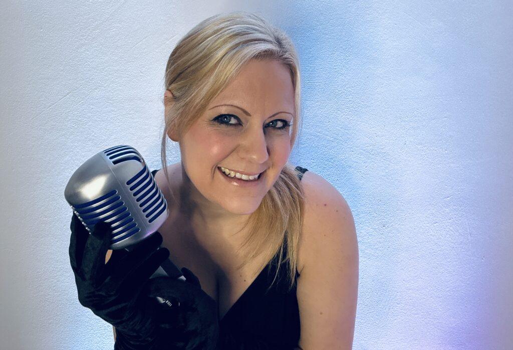 Tracy With Microphone - one of the best Essex Wedding Singers