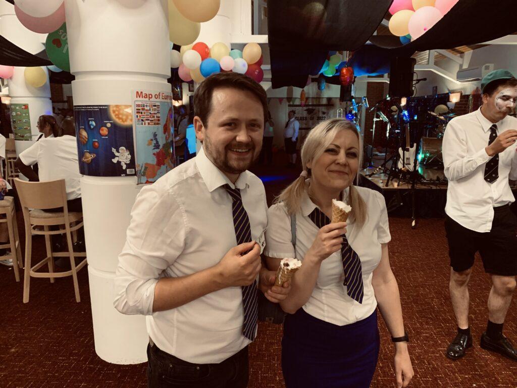 Tracy and band member dressed in school shirts and ties at a back to school event. Tribute Act Essex.